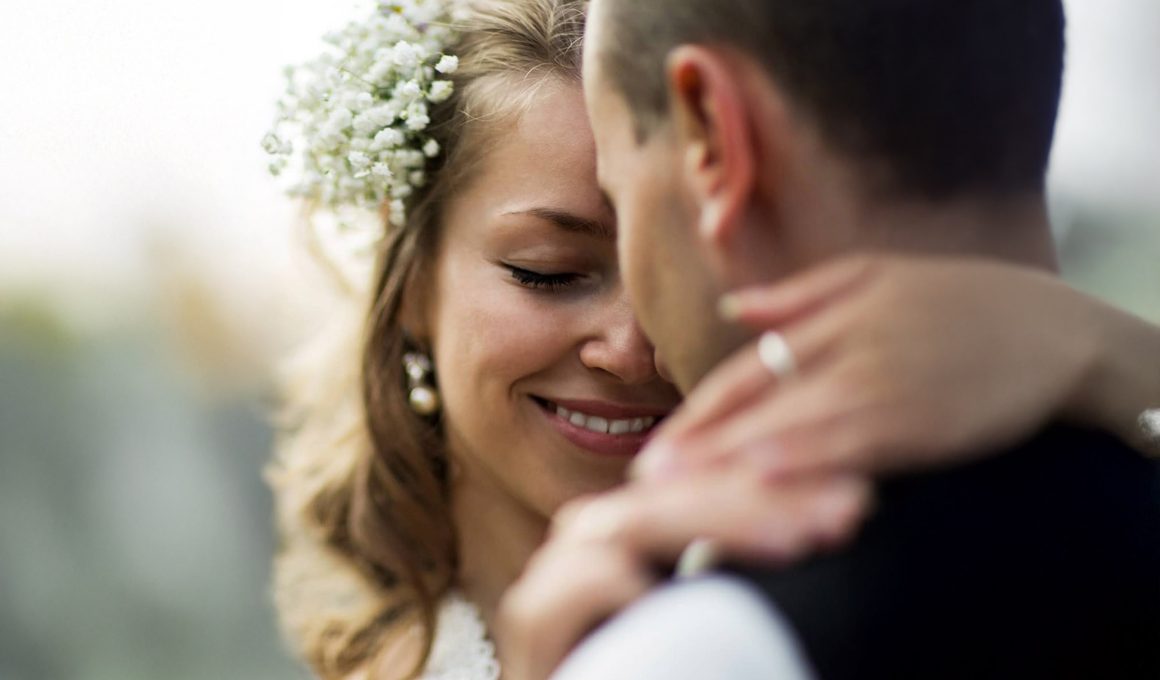 A bridge and groom embracing