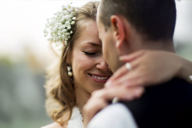 A bridge and groom embracing